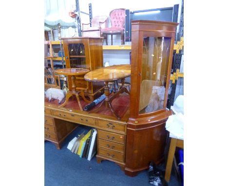 A MODERN YEW WOOD OVAL COFFEE TABLE, similar wine table, glazed corner cupboard, a hi-fi cabinet and a brass standard lamp wi