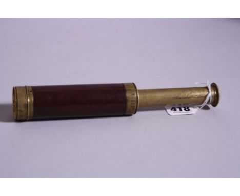 A HAND HELD FOUR DRAWER BRASS TELESCOPE, engraved 'W. Youle, 79 Leadenhaff St, London'