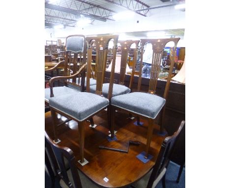 A SET OF FOUR EDWARDIAN MAHOGANY FRAMED DINING CHAIRS, inlaid with mother of pearl, etc, with grey upholstered overstuffed se