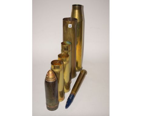 Five British WWI shell cases; a post war representative shell; and a timer shell.