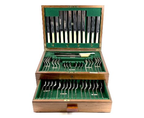 A 1930's part canteen of silver plated cutlery set for six by Harrods Ltd, the knives with ivory handles and stainless steel 