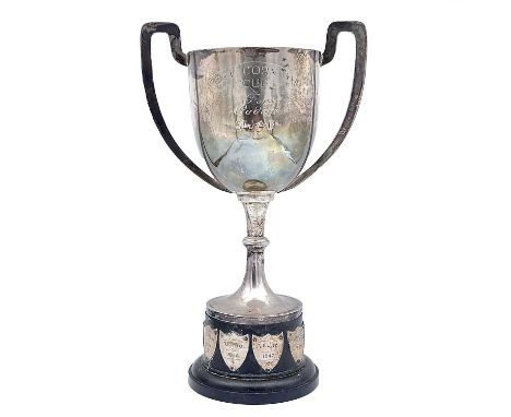 A George VI silver twin handle pedestal trophy cup, engraved dedications, Birmingham 1938, weight 7.87 toz, upon a celluloid 