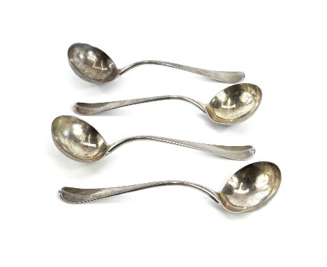 A rare set of four Georgian silver Hanoverian pattern sauce ladles, indistinct marks, the handle backs with engraved crest, w