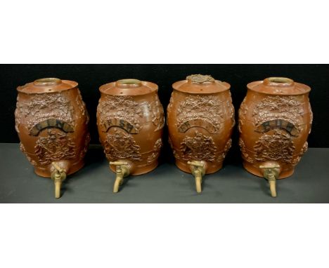 A set of four Brampton stoneware spirit barrels, each relief sprigged with Knights and Lion, grape vines and Armorial, named 