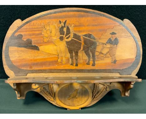 An Art Nouveau period marquetry pipe rack, inlaid with a ploughman at work, c.1910 