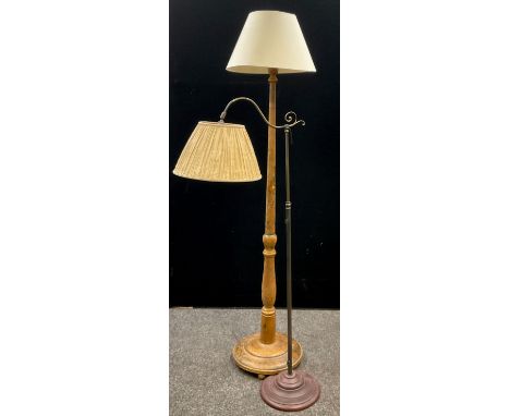 An early 20th century painted hardwood standard lamp, turned column, and circular base, 175cm high (with shade);  a brass ris