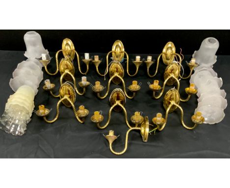 A set of six two branch brass light fixtures, four extra similar, conforming light shades, 16cm high 