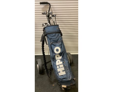 Golfing - a set of Howson Enforcer golf clubs, Hippo golf bag, folding two wheeled cart carrier. 