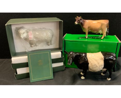 Beswick Belted Galloway cow,14cm high, boxed, another similar Beswick cow, a model sheep, 15cm long (3) 