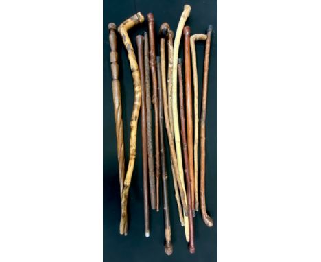 A knobkerry style hedgerow walking stick, other assorted inc carved example (12) 