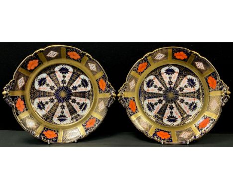 A pair of Royal Crown Derby Imari 1128 pattern soup tureen stands, each with a pair of acorn handles, blue grounds , 37cm wid