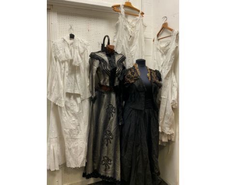 A collection of Victorian clothing and attire comprised,  pin striped long skirt and matching blouse, another matching blouse