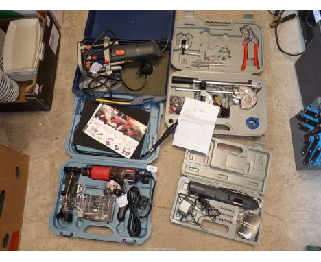 A plumbers kit, rotary tool, a router and a screwdriver.
