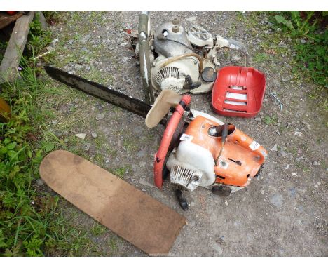A Stihl chainsaw and another Stihl chainsaw with no cutter bar. One has good compression, the other the recoil starter needs 
