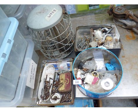 A bird feeder and three boxes of miscellaneous to include: screws, screwdriver bits, etc.