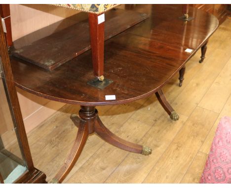 A mahogany twin pillar table, with one leaf, W.160cm