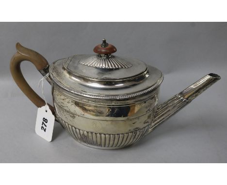 A George III demi fluted silver teapot by Richard Cook, London 1801, gross 17 oz.