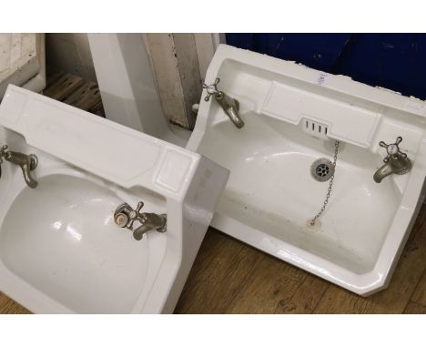 Two ceramic basins and one pedestal