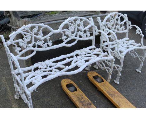 A cast metal painted bench and chair W.117cm chair W.59cm