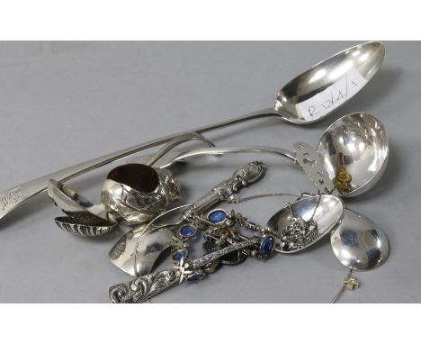 A Georgian basting spoon, Irish silver sauce ladle and other items.