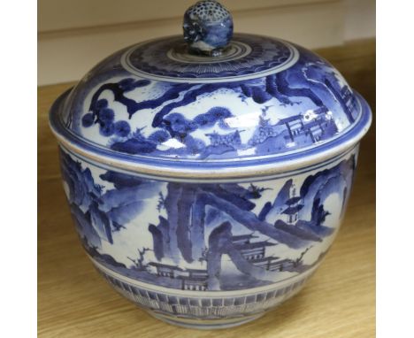 A 19th century Chinese blue and white large bowl and cover, with pomegranate finial (cover repaired)