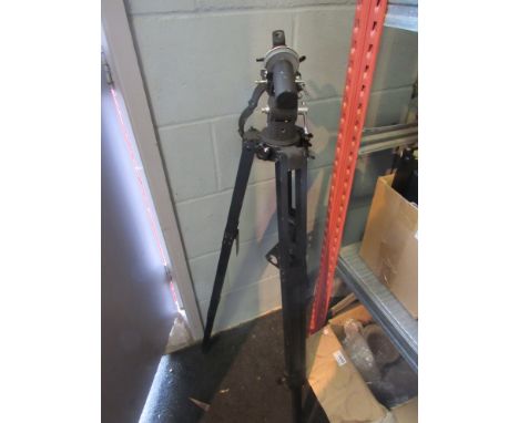 A Celestron telescope on tripod and another telescope