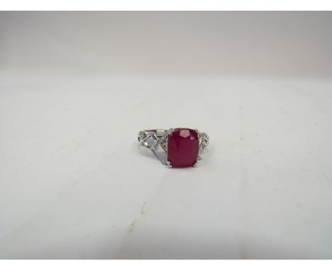A Thai ruby ring stamped 925, size U, with certificate