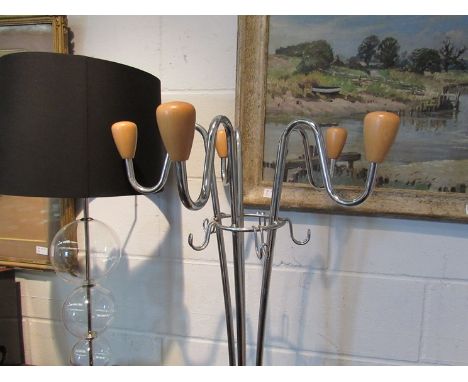 An Italian blackened metal and chrome hat, coat and stick stand