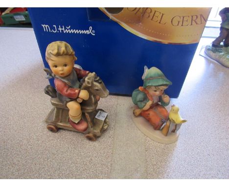 Two boxed Goebel figures, girl on rocking horse and "Best Friends" with two Goebel figures including boy on toy horse 