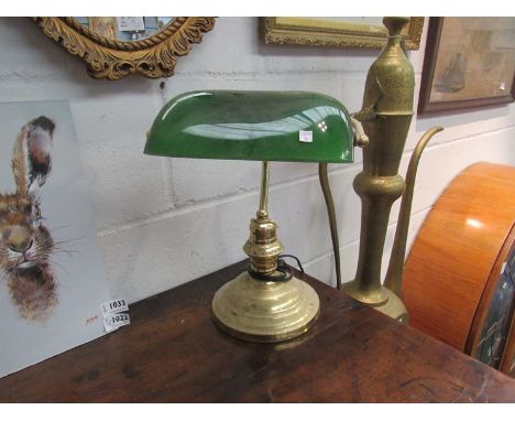 A brass based bankers lamp with green glass shade, no plug 