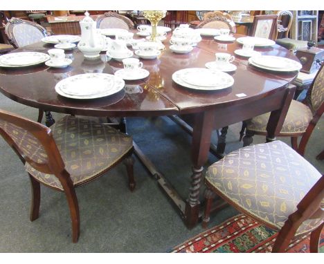 An 18th Century red walnut gate-leg table, barley-twist legs