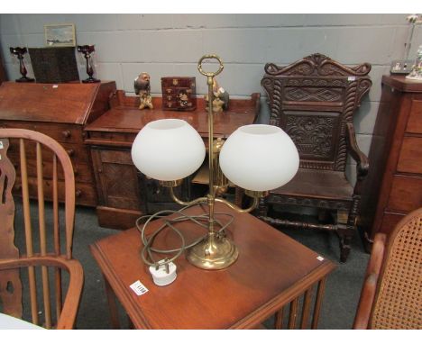 A brass twin sconce table lamp