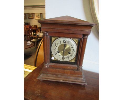 A mahogany mantel clock with Arabic dial, veneer missing    