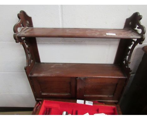 An Edwardian mahogany wall shelf with twin door cabinet, 55cm x 53cm