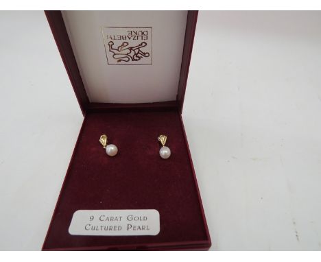 A pair of cultured pearl 9ct gold drop earrings