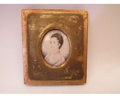 An 18th Century ivory miniature portrait with details verso dating it to circa 1770 and initialled W.P. gilt framed 
