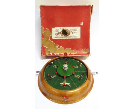 A BOWMAN 'CASINO' GREYHOUND RACING GAME  boxed (the box worn, torn and tape-repaired); together with a Chad Valley Escalado g