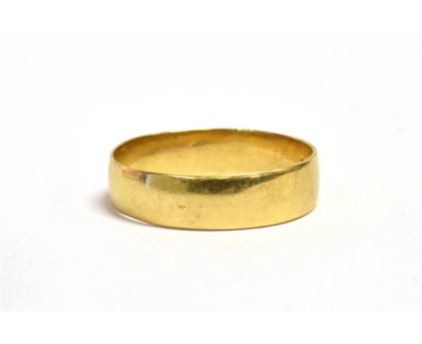 AN 18CT GOLD BAND RING hallmarked for Birmingham 1916, ring size W-W ½ weight approx. 4.4 grams