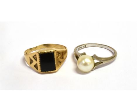 A 9CT GOLD SIGNET RING Faded hallmark and warped shank, ring size N 1/2 , weight 2grams, together with a white metal pearl dr