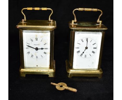A BRASS CASED CARRIAGE CLOCK the enamel dial with Roman numerals, 12cm high with carrying handle down; together with a Bayard