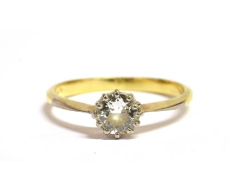 AN 18CT GOLD DIAMOND SOLITAIRE RING With the round cut diamond measuring approx. 4 mm in diameter, shank marked 18 K, ring si