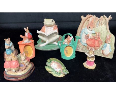 A COLLECTION OF BORDER FINE ARTS BEATRIX POTTER ITEMS  comprising Jeremy Fisher money box, Mrs Rabbit easel back plaque, two 