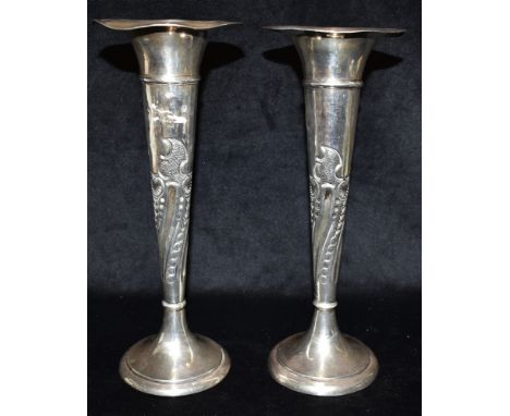 A PAIR OF EDWARDIAN WEIGHTED SILVER TRUMPET VASES With a punched pattern design, hallmarked for Chester 1906 and standing app