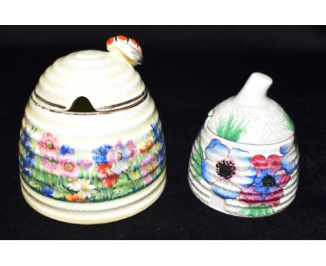 A CLARICE CLIFF NEWPORT POTTERY 'RADIANCE' BEEHIVE PATTERN HONEY POT  with bee finial, stamped to base 'Clarice Cliff Newport