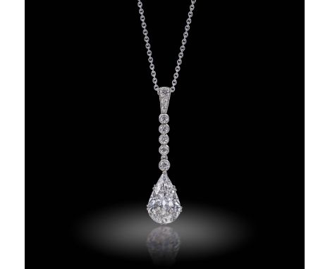 An early 20th-century diamond pendant, the pear-shaped diamond weighs 3.80cts and suspends from an articulated line of circul