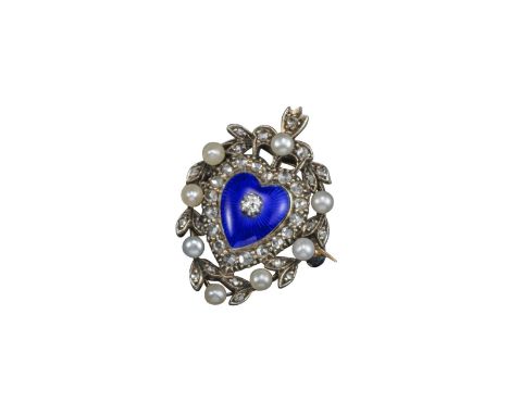 An Edwardian heart-shaped brooch pendant, centred with a heart-shaped blue enamel plaque, with diamond centre and surround of