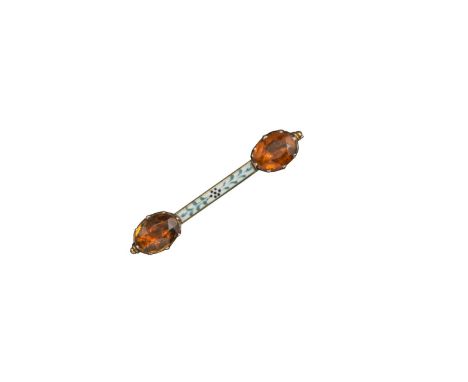 A citrine and enamel brooch by Carlo and Arthur Giuliano, the terminals each set with an oval-shaped citrine, conjoined with 