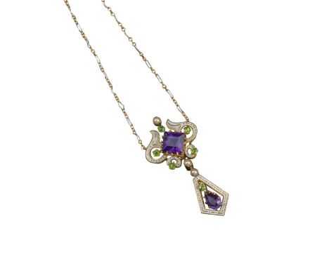 An early 20th-century amethyst and demantoid garnet suffragette pendant, set with a square-shaped amethyst within scroll enam