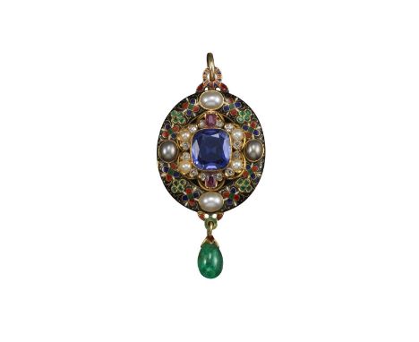 A Victorian Holbeinesque gold pendant, centred with a large cushion-shaped iolite within a border of two rubies, four seed pe