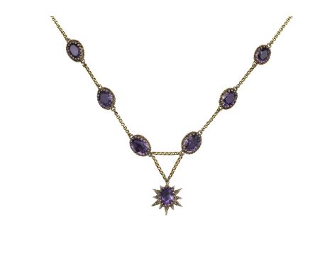 A Victorian amethyst necklace, the graduated oval-shaped amethysts set in silver-gilt coronet mounts and conjoined with circu